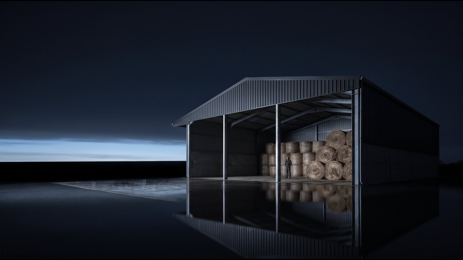 JS-A2 agricultural store, galvanised steel frame with open front, Irish countryside at dusk
